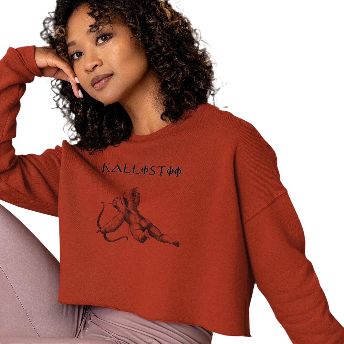 Kallistii Eros crop sweatshirt in rust color featuring a cupid graphic and relaxed fit