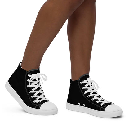 Kallistii black high-top shoes for women with white laces and rubber soles shown on model