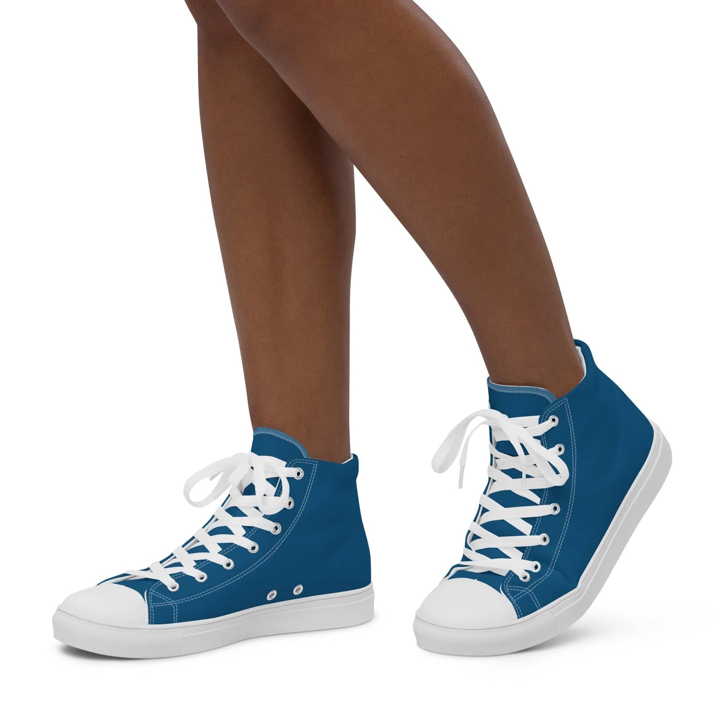 Kallistii blue high-top shoes for women with white laces and rubber soles on a model