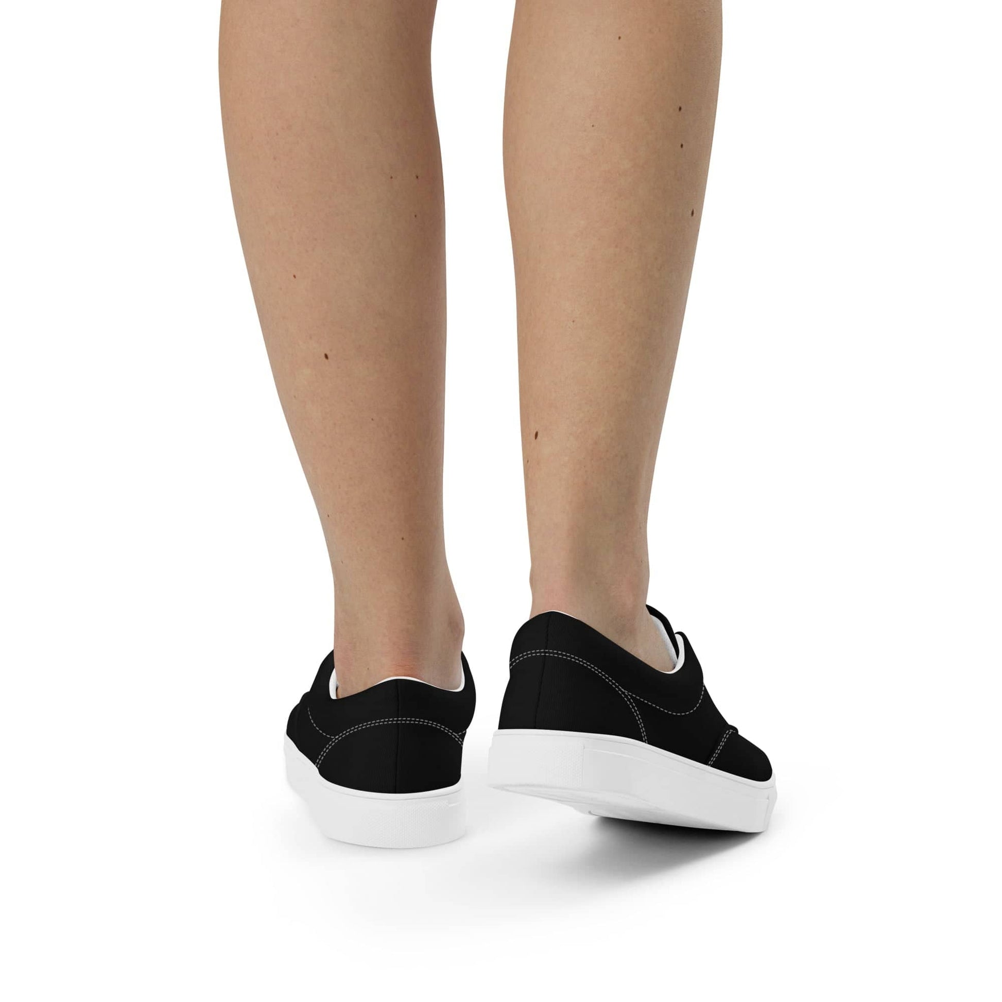 Kallistii black casual low-top shoes for women shown from the back on a white background