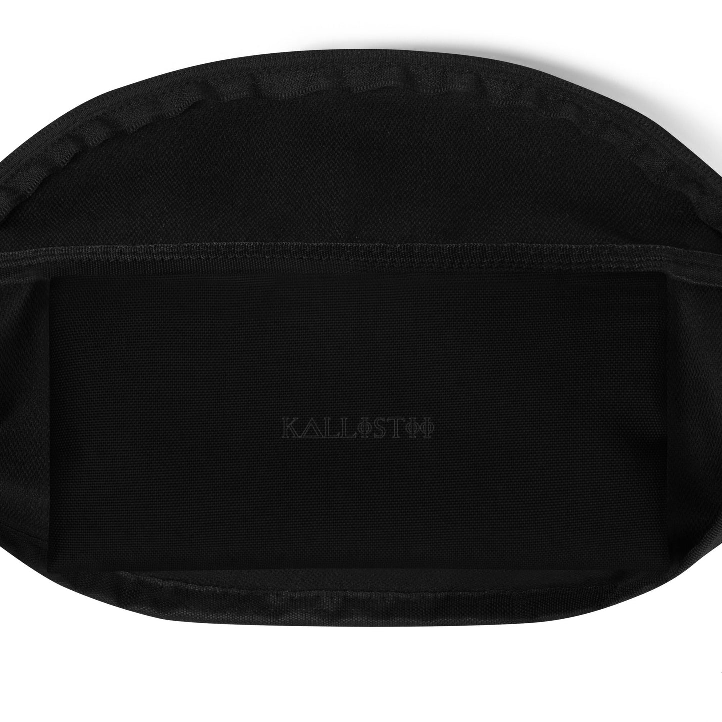 Interior view of kallistii harlequin crossbody bag showing black fabric lining and pocket