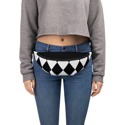 Kallistii harlequin crossbody bag in black and white worn at waist with adjustable strap