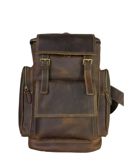 Kallistii high capacity leather backpack in dark brown with multiple pockets and buckle straps