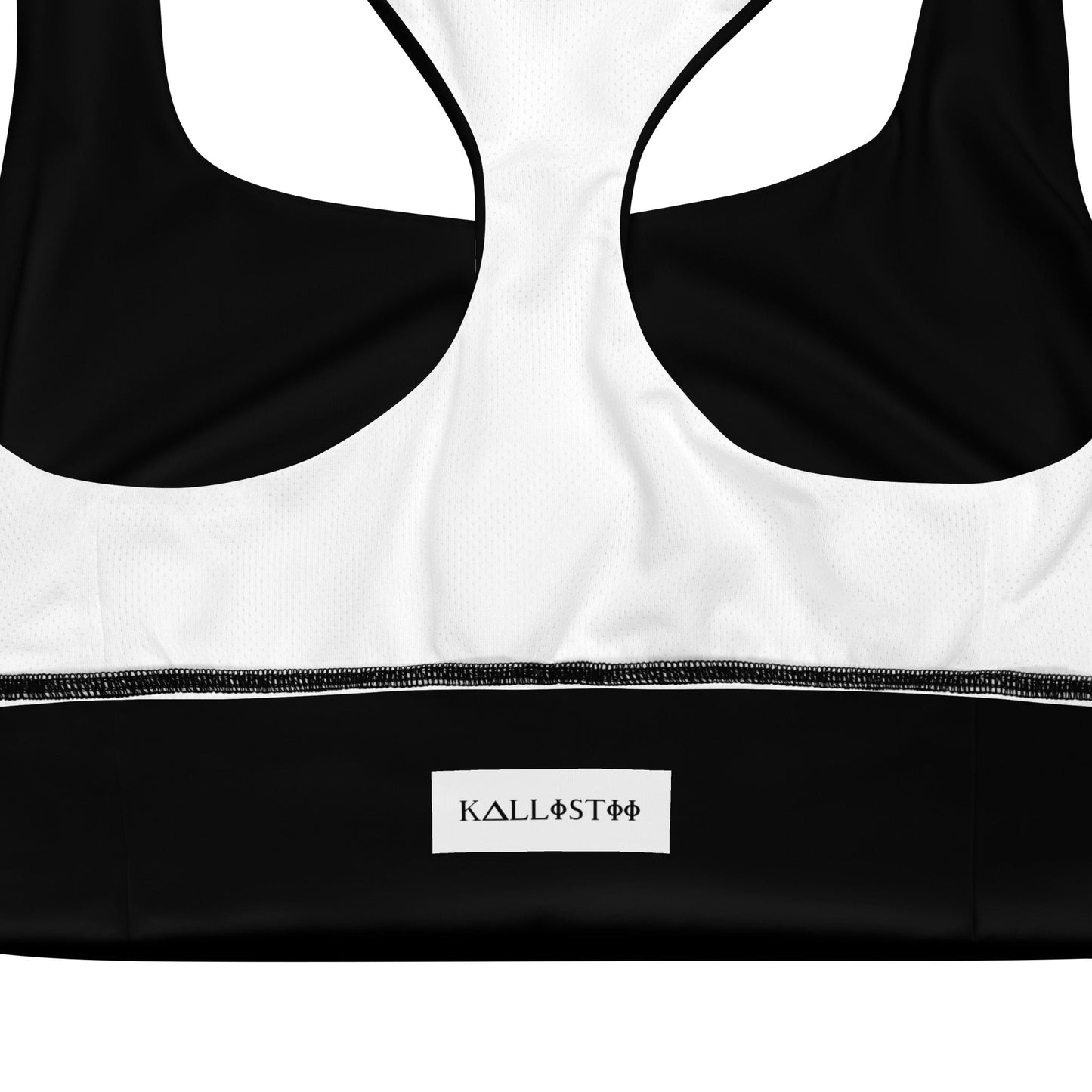Black and white KALLISTII activewear sports bra with racerback design and brand logo tag