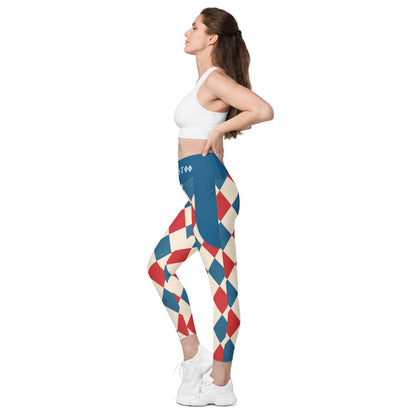 Women wearing kallistii harlequin leggings with red blue and cream diamond pattern and white sports bra