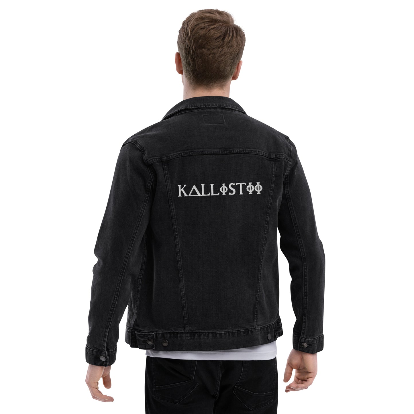 Back view of man wearing black embroidered denim jacket with kallistii logo on the back