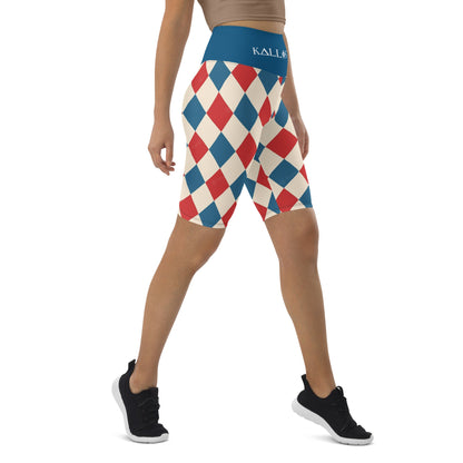 Kallistii harlequin active shorts with red and blue diamond pattern and blue waistband