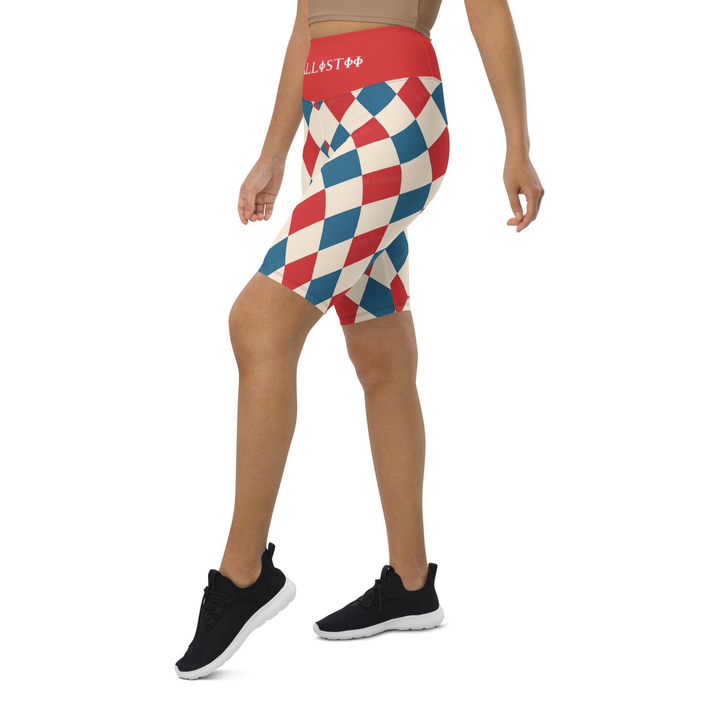 Kallistii harlequin active shorts with red blue and cream diamond pattern worn with black sneakers