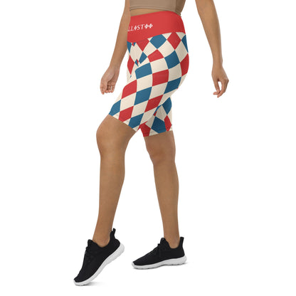 Kallistii harlequin active shorts with red blue and cream diamond pattern worn with black sneakers