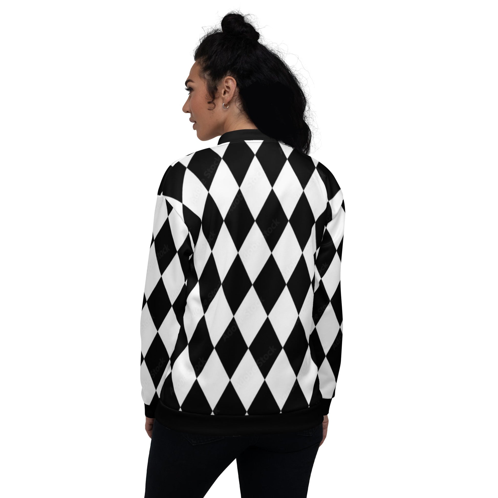 Kallistii harlequin bomber jacket in black and white diamond pattern worn by woman facing backwards