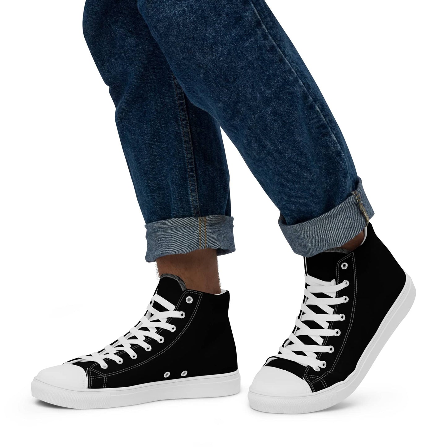 Black high-top statement sneakers for men with white laces and sole styled with cuffed jeans