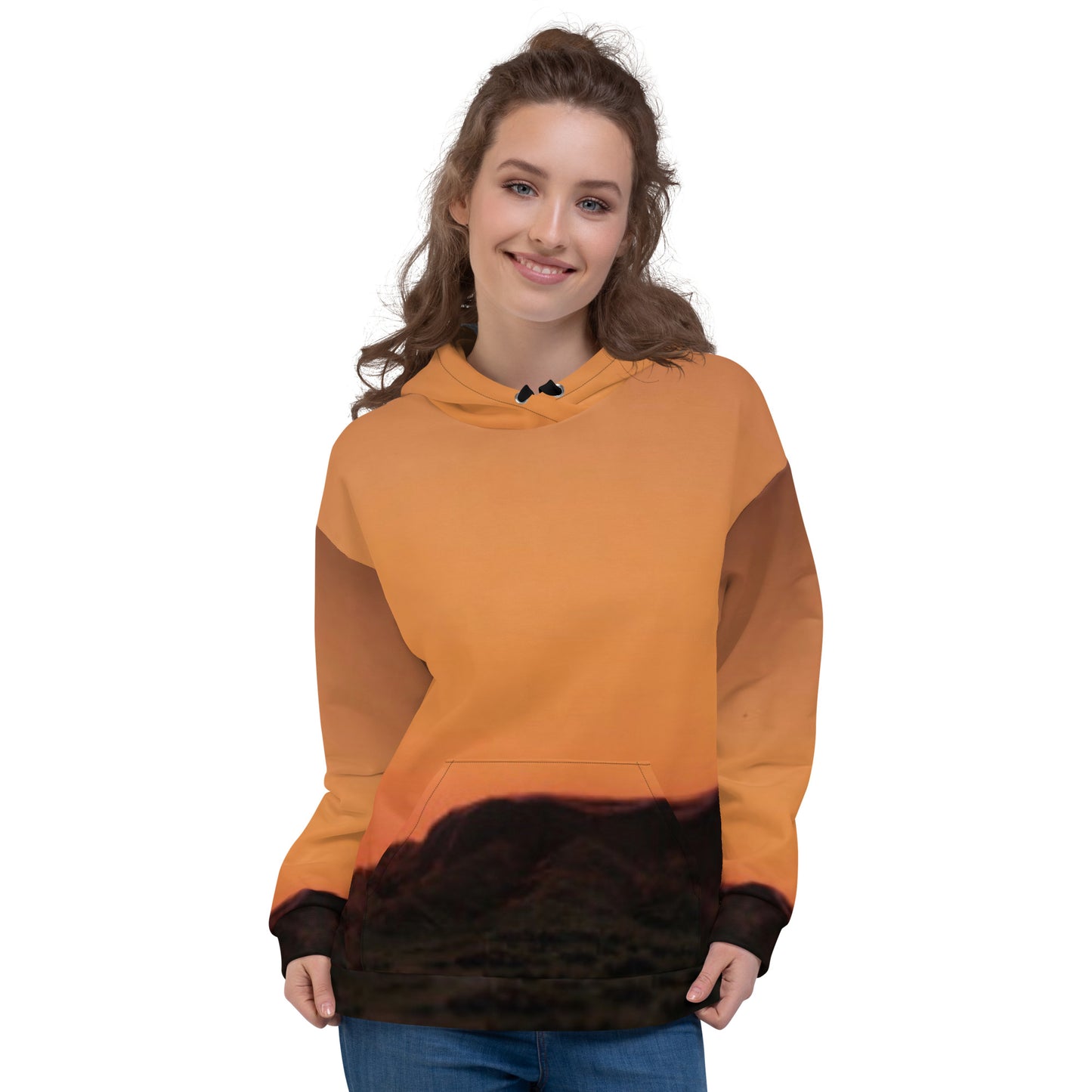kallistii Mesa Hoodie sunset design with orange and black mountain landscape on a woman