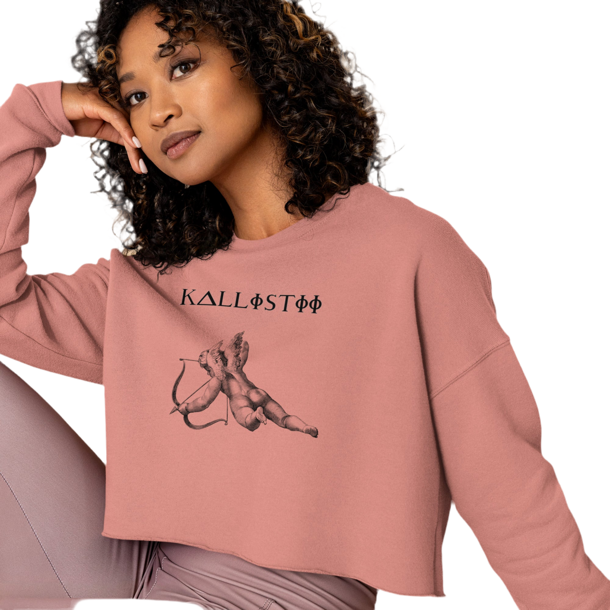 Woman wearing a pink Eros crop sweatshirt by kallistii featuring a cupid graphic and relaxed fit