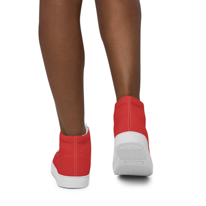 Red high-top shoes for women with white soles shown from the back on a person