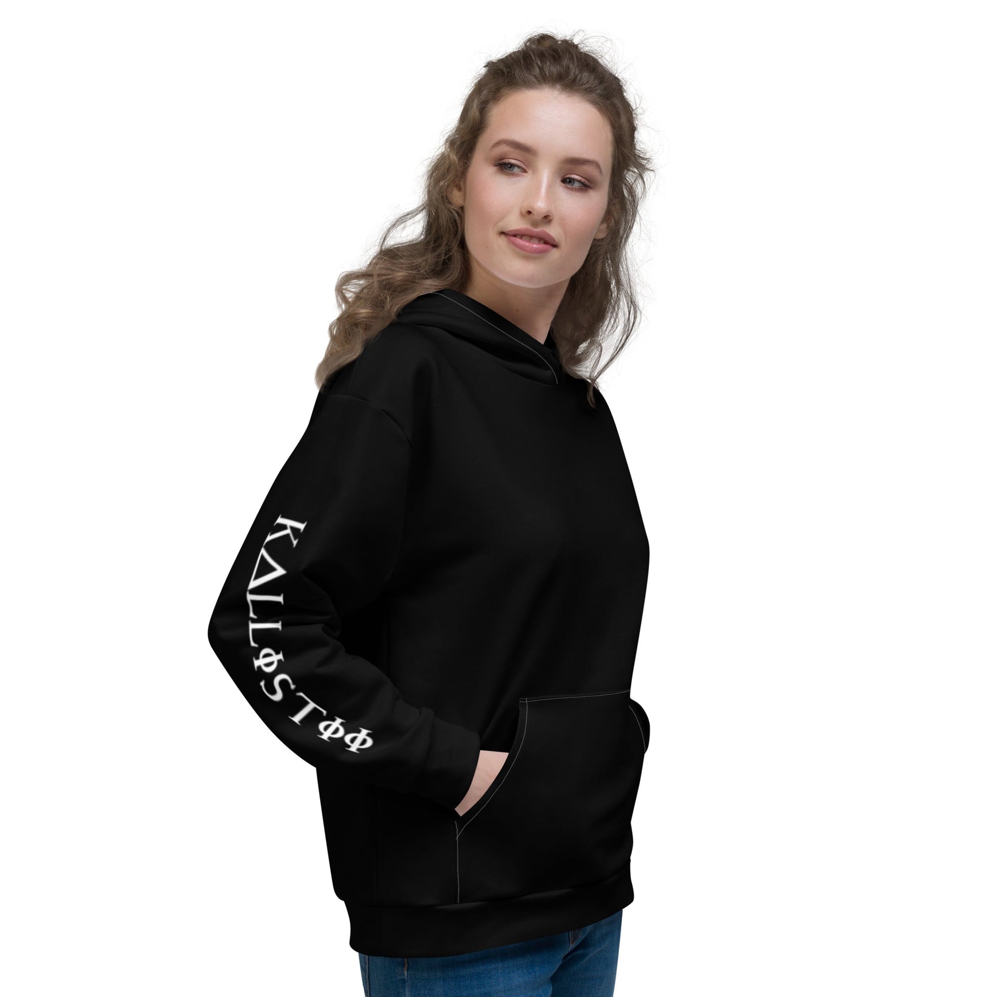 Woman wearing black unique logo hoodie by kallistii with white text on sleeve and front pocket