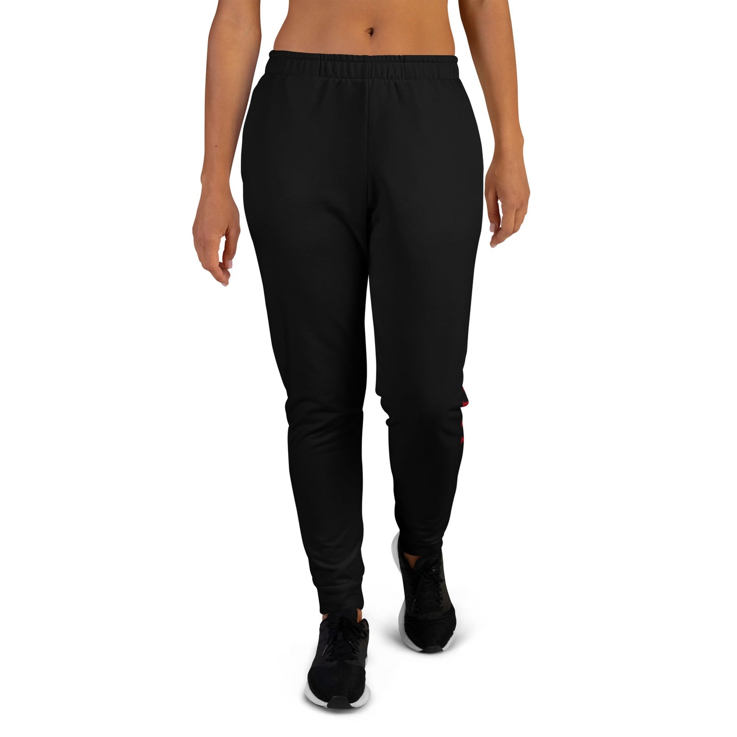 Black unique logo joggers from kallistii with elastic waistband and tapered legs worn by a model