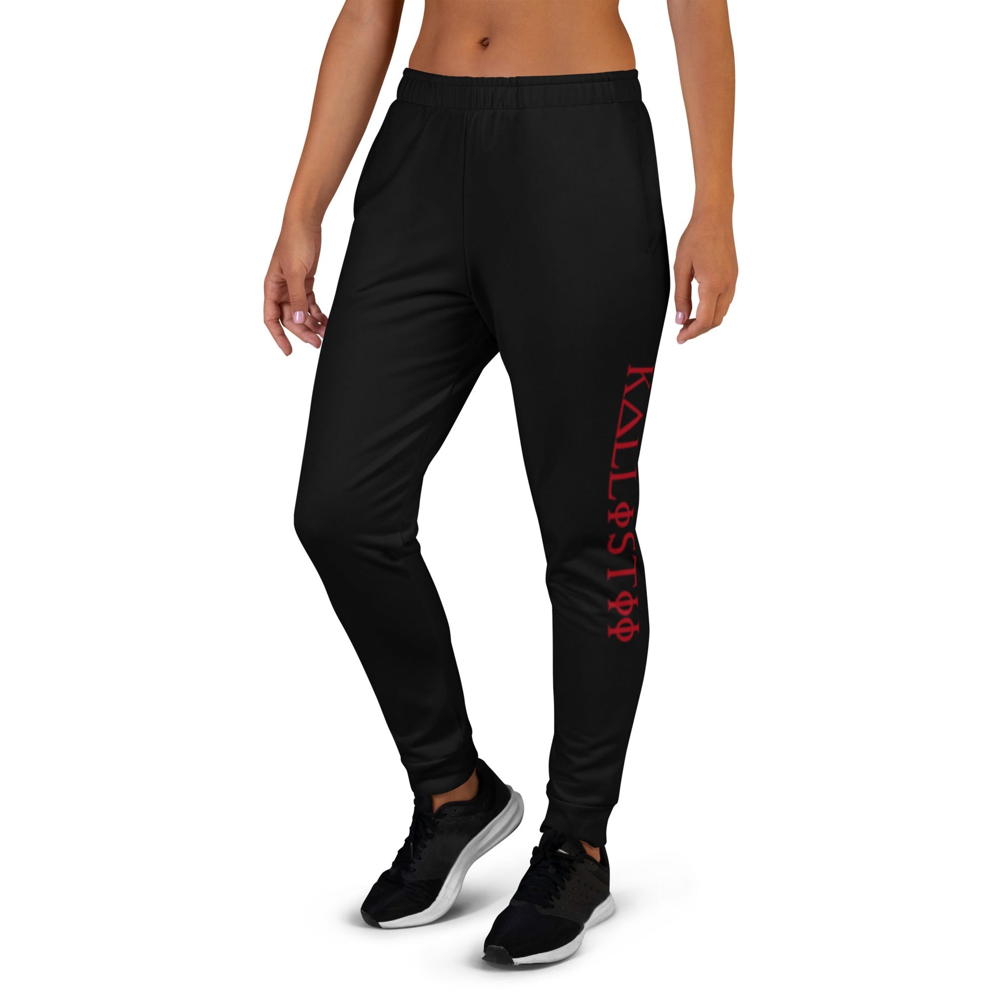 Black kallistii unique logo joggers with red side print worn with black sneakers