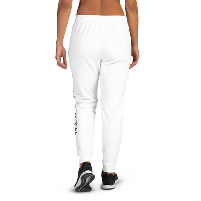 Back view of white unique logo joggers by kallistii worn with black sneakers