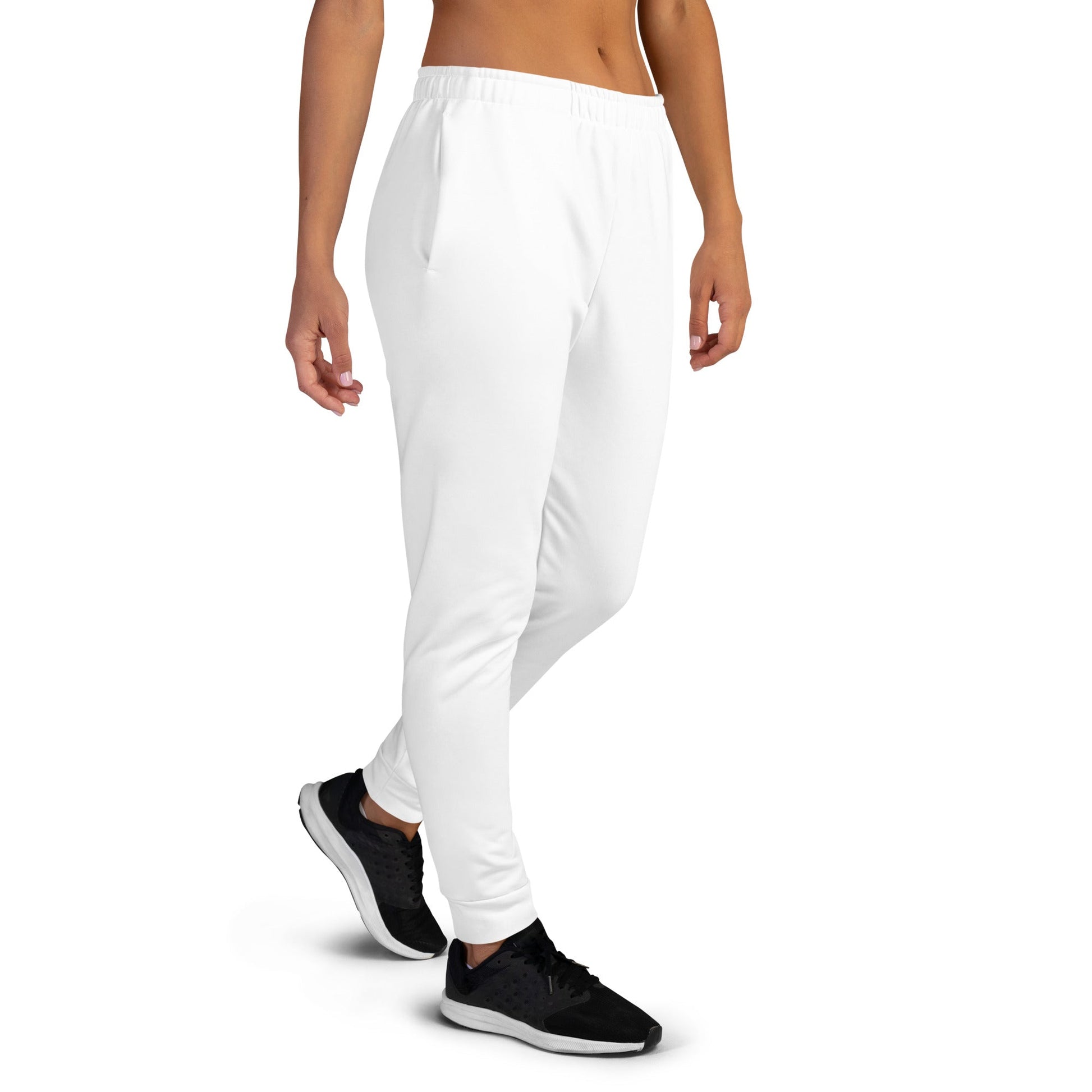 White unique logo joggers with elastic waistband and side pockets worn with black sneakers