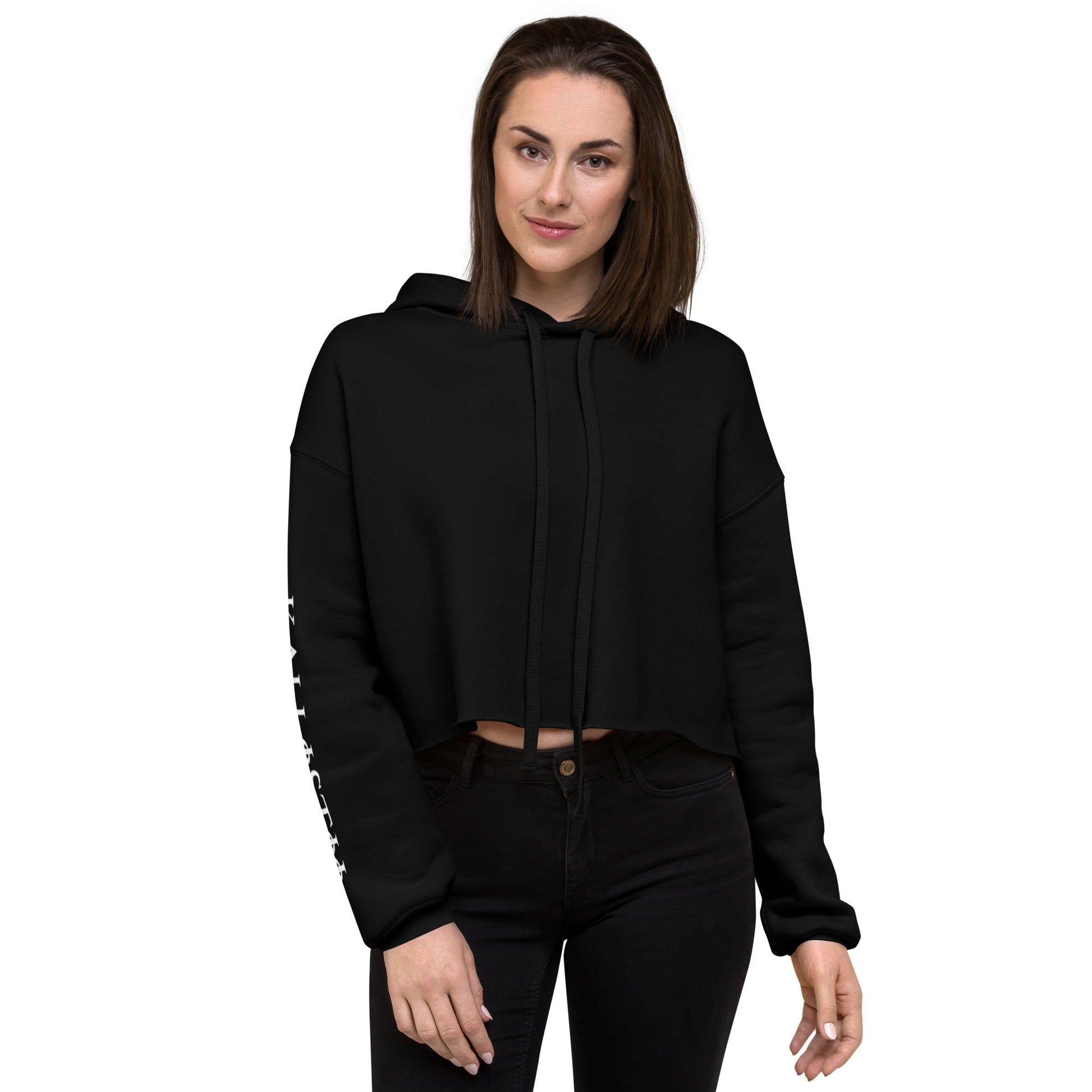 Black womens fashion crop hoodie with long sleeves and hood worn by model in casual style