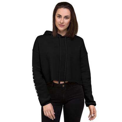 Black womens fashion crop hoodie with long sleeves and hood worn by model in casual style