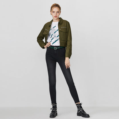 Kallistii black fade skinny jeans worn with green jacket and graphic white t-shirt