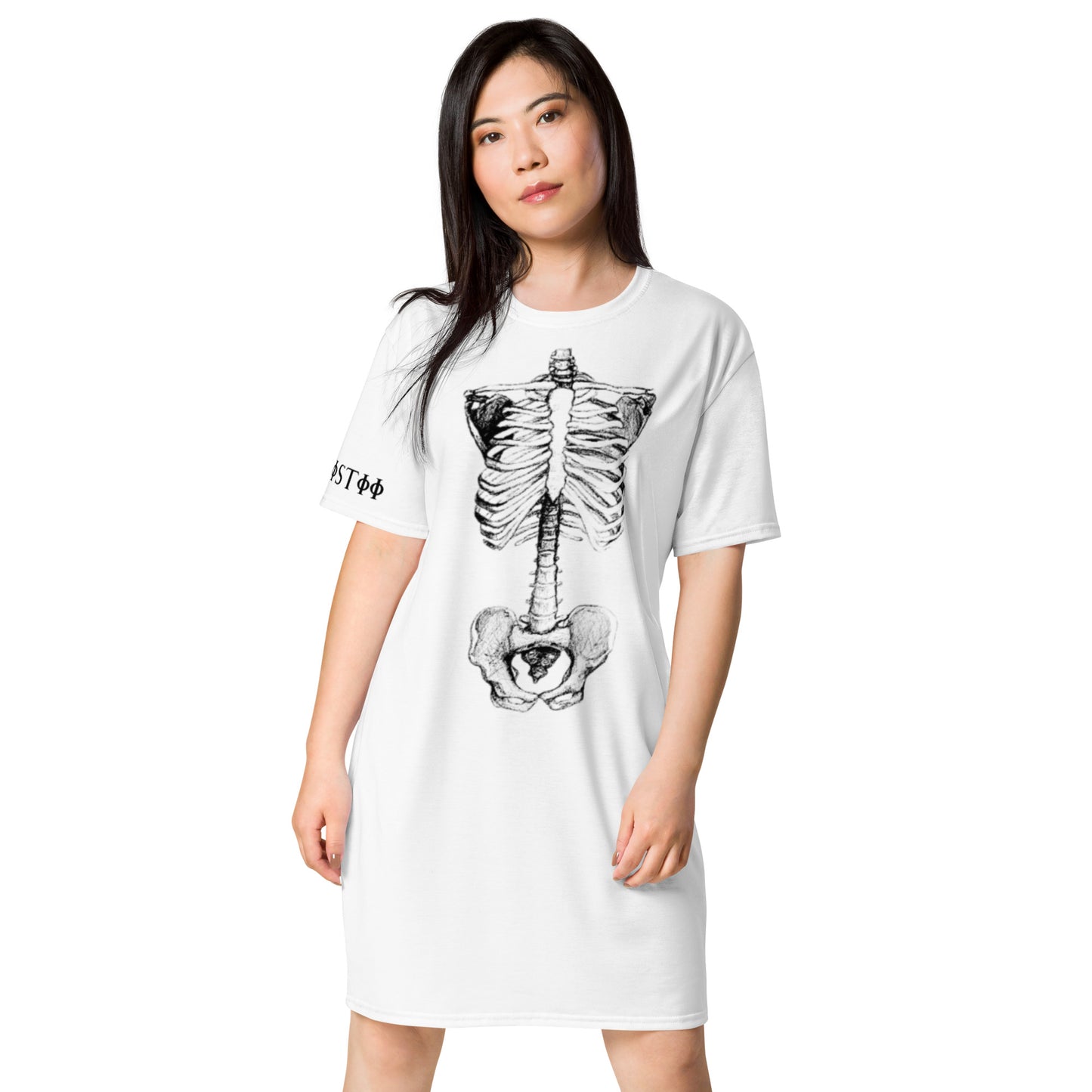 Woman wearing white kallistii bone anatomy t-shirt dress with black skeletal print on front