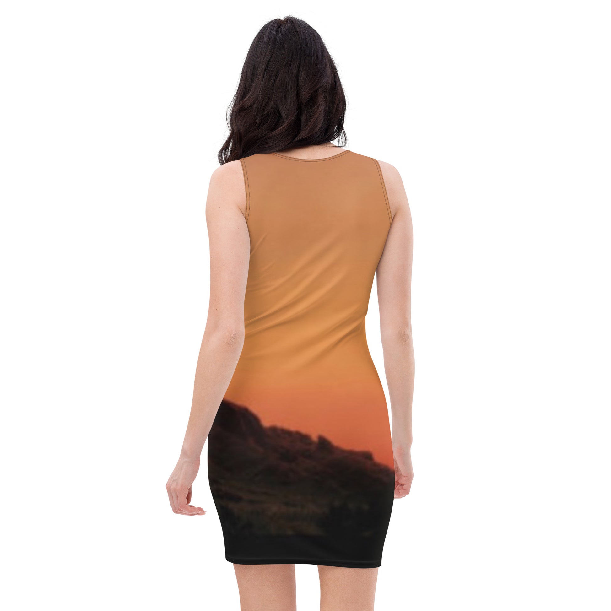 Back view of woman wearing kallistii mesa bodycon dress with sunset mountain print design