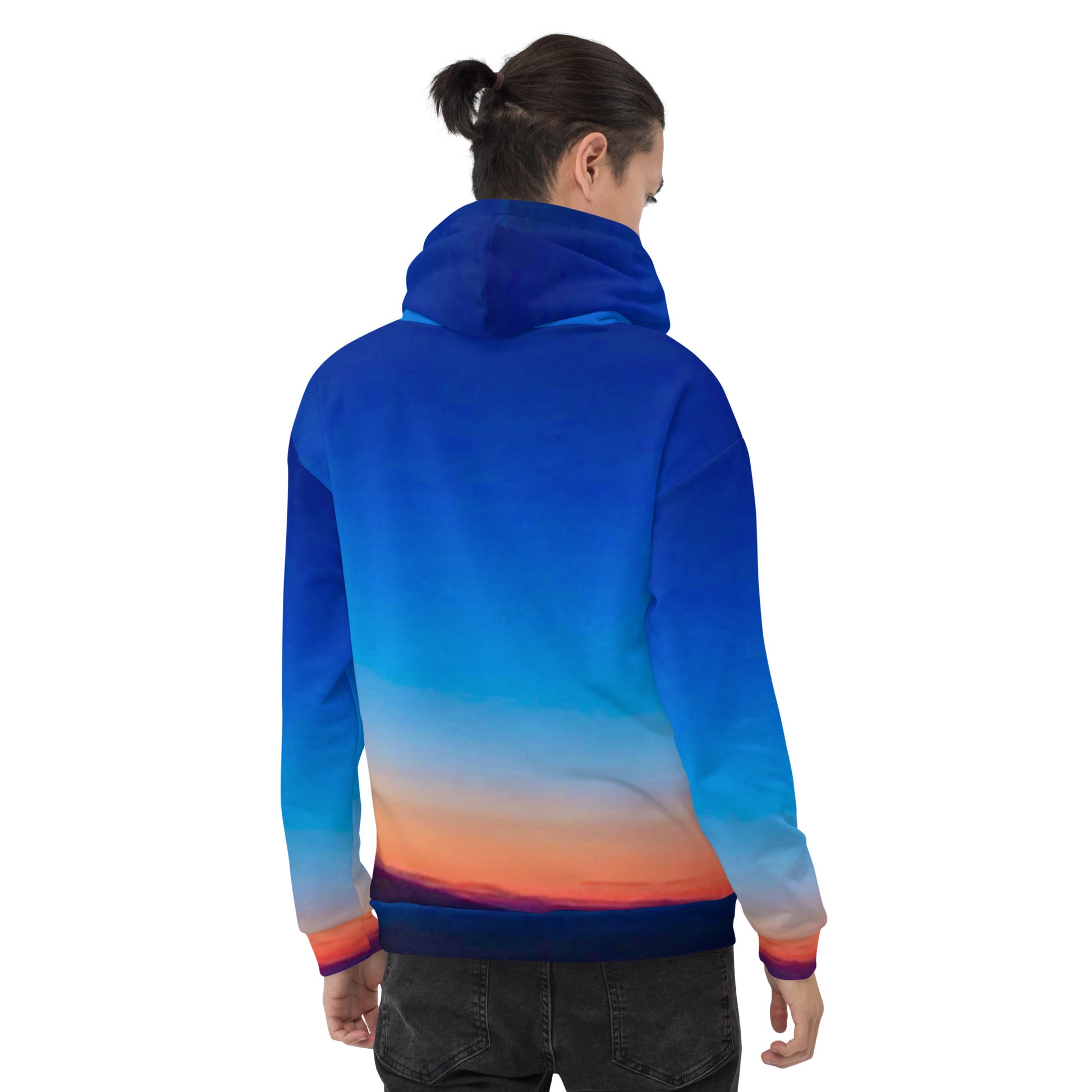 Back view of man wearing kallistii skyline hoodie unisex with gradient blue to orange sunset design