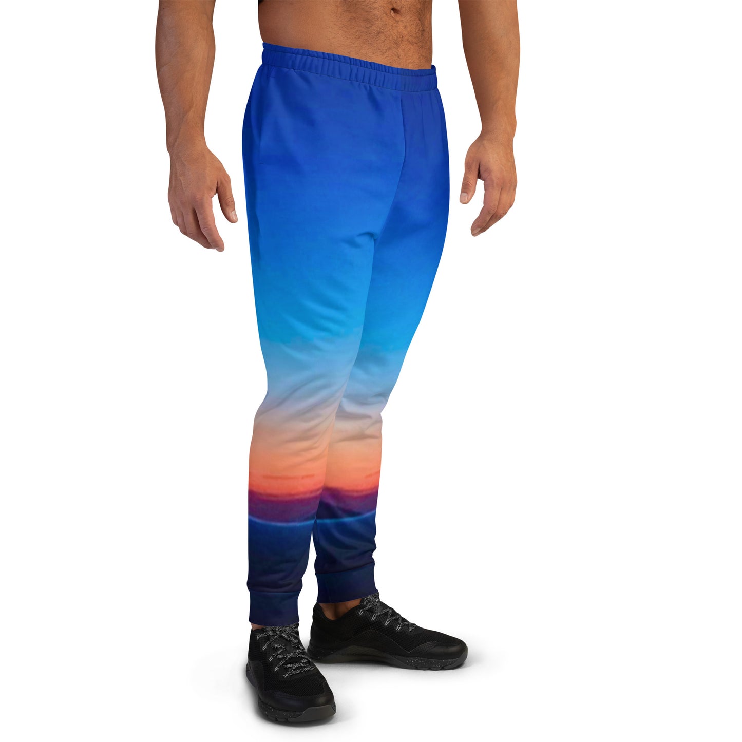 kallistii skyline mens joggers with blue and orange gradient sunset design worn by male model