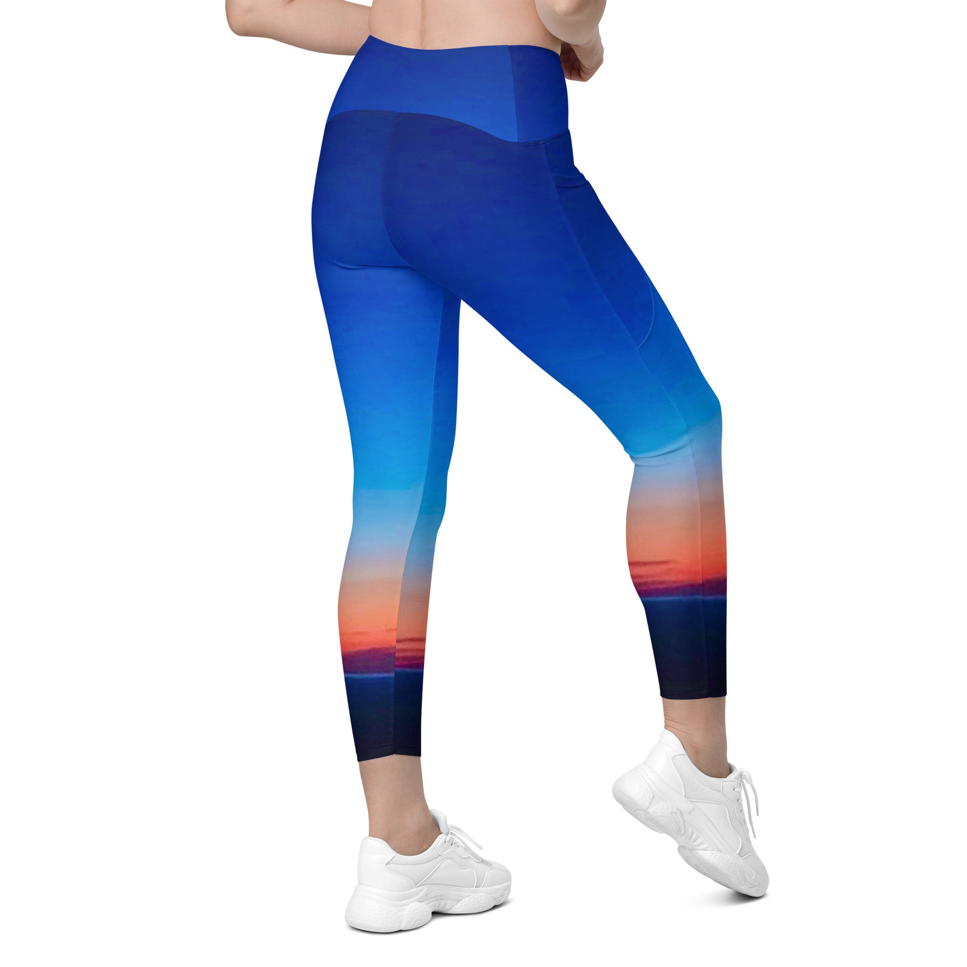 Kallistii skyline print womens leggings in blue with sunset cityscape design and high waist fit