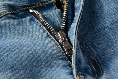 Close-up of zipper and stitching on trendy street style denim pants by kallistii